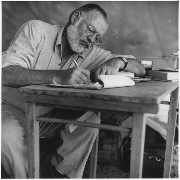 Ernest Hemingway Writing at Campsite in Kenya
